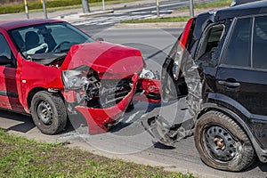 Car crash accident on street, damaged automobiles after collision in city