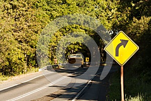 Car crash in a curved road with skid marks