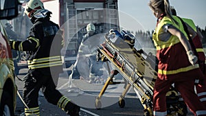 On the Car Crash Traffic Accident Scene: Paramedics and Firefighters Rescue Injured Victims Trappe