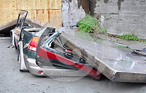 Car Crushed in Earthquake. photo