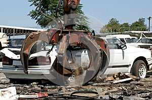 Car crushing at crushing yard