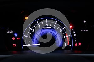 Car dashboard close-up with warning lights
