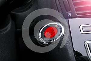 Car dashboard with focus on engine start stop button. Modern car interior details. start/stop button. Car inside