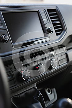 Car dashboard with multimedia display and climate control