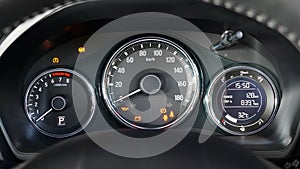 Car dashboard panel, Automobile speedometer and display control system, Engine started in parking mode.