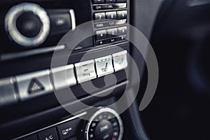 Car dashboard with seat ventilation and heating system. Modern details of electric car