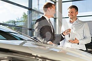 Car dealer selling car