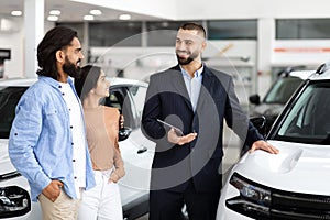 Car dealership interaction with salesman and customers