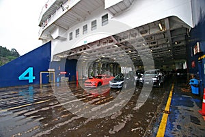 Car deck on ferry on rainy day