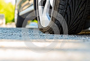 Car with deflated wheel