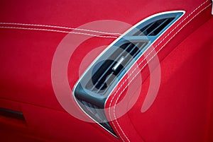 Car deflector. Car interior details. Red and black alcantara with stitching photo