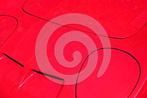Car design detail, abstract automobile background - red engine h
