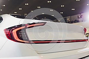 Car detail. New led taillight by night. The rear lights of the car, in hybrid sports car. Developed Car`s rear brake