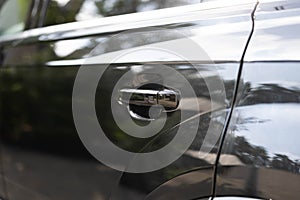 Car door handle. Keyless entry car door handle with keyless go touch sensor. Automatic opening of a car door without a key. Access