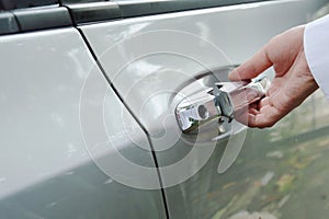 Car door handle opened by hand up and pulling