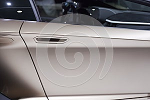 Car door with handle and window part at Autosalon Genf 2019 in Geneva, Switzerland