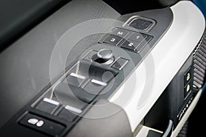 Car door lock buttons and seats memory mode