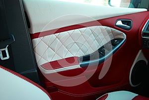 Car Doors. Car interior details. White red leather with stitching