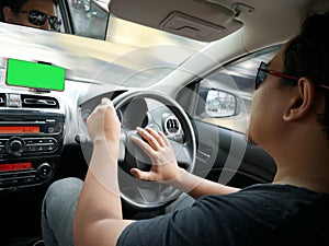 Car Driver With Smart Phone on Dashboard
