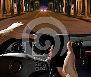 Car driver using cell phone inside a car