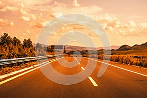 Car driving on the asphalt road, autumn