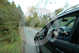 Car driving on country road