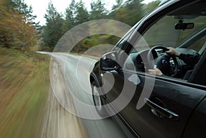 Car driving on country road