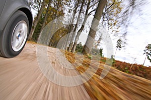 Car driving on country road. photo