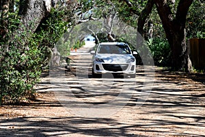 Car driving on dirt road