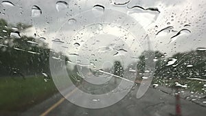 A car driving on expressway with heavy rain