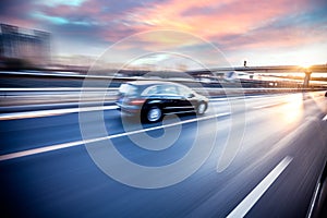 Car driving on freeway, motion blur