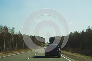 Car driving on a highway. auto moving on a roadway