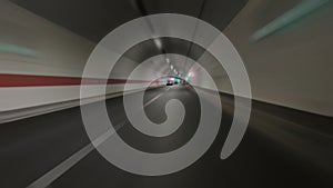 Car driving on highway and tunnel at night