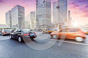 Car driving on road, motion blur