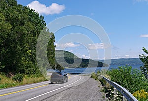 Car driving on a scenic highway