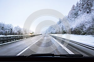 Car Driving on Snowy Road Highway Autobahn German Transportation