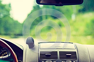 Car driving, view from inside on dashboard