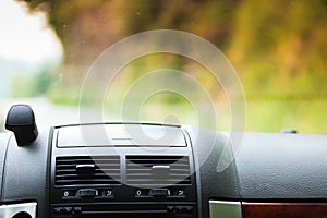 Car driving, view from inside on dashboard