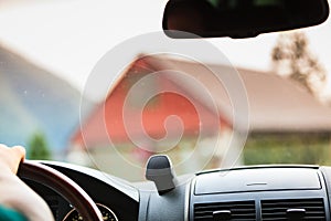 Car driving, view from inside on dashboard