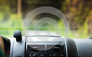 Car driving, view from inside on dashboard