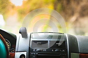 Car driving, view from inside on dashboard