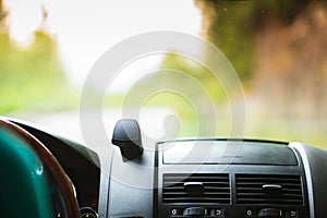 Car driving, view from inside on dashboard