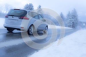 Car driving in winter conditions