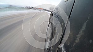 Car driving through a winter storm with snow. time lapse