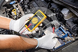 Car Electronic Maintenance Service And Check. Worker Man