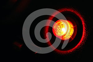 Car emergency button at night - as danger symbol