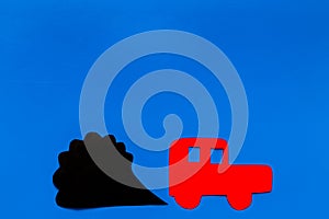 Car emitting dirty smoke. Pollution concept. Car and smoke cutout on blue background top view copy space