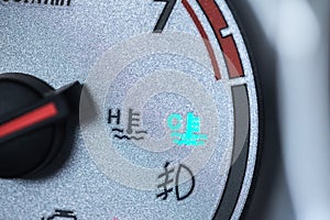 Car engine cool light on car dash board meter gauge