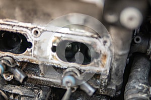 car engine Engine cleaning process the intake manifold. Close up manifold ports. Close up of dirty intake manifold