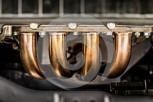 Car engine exhaust header photo